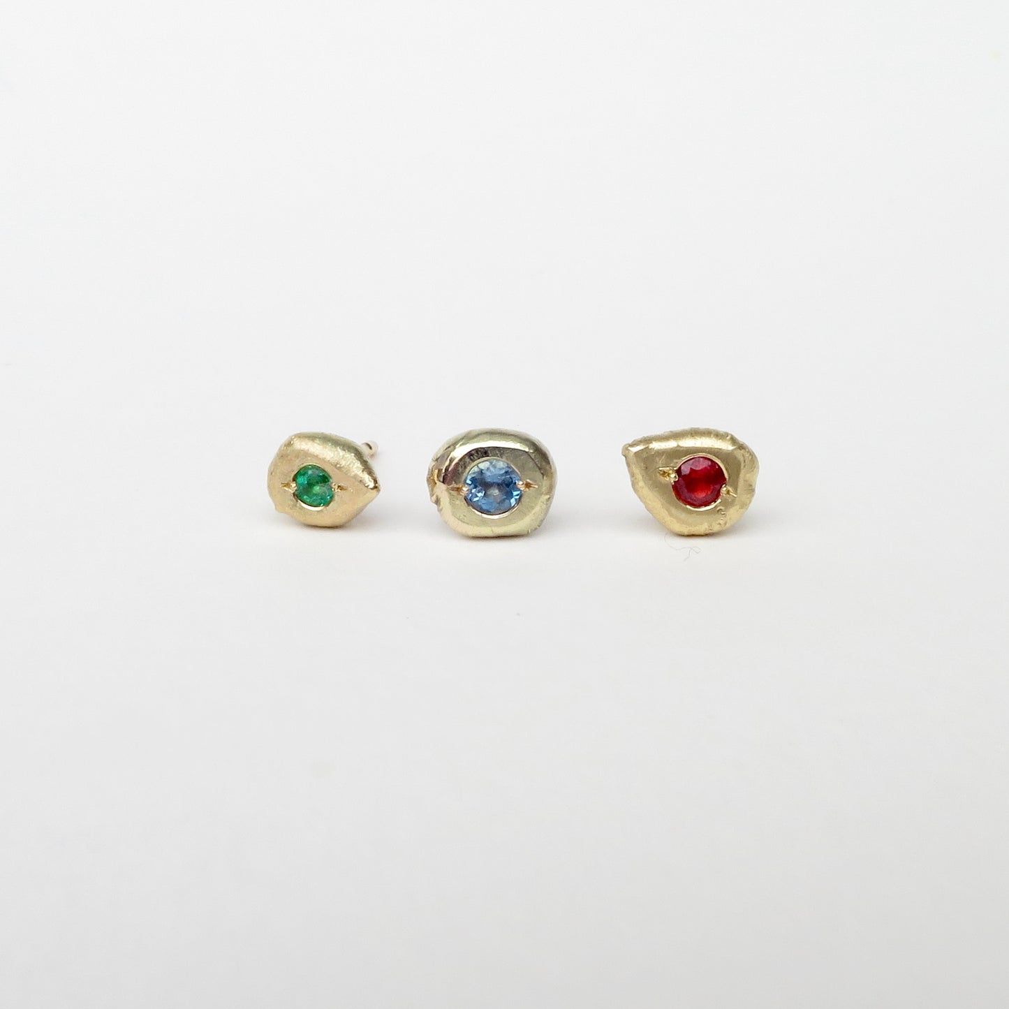 Freeform 9ct gold studs with emerald