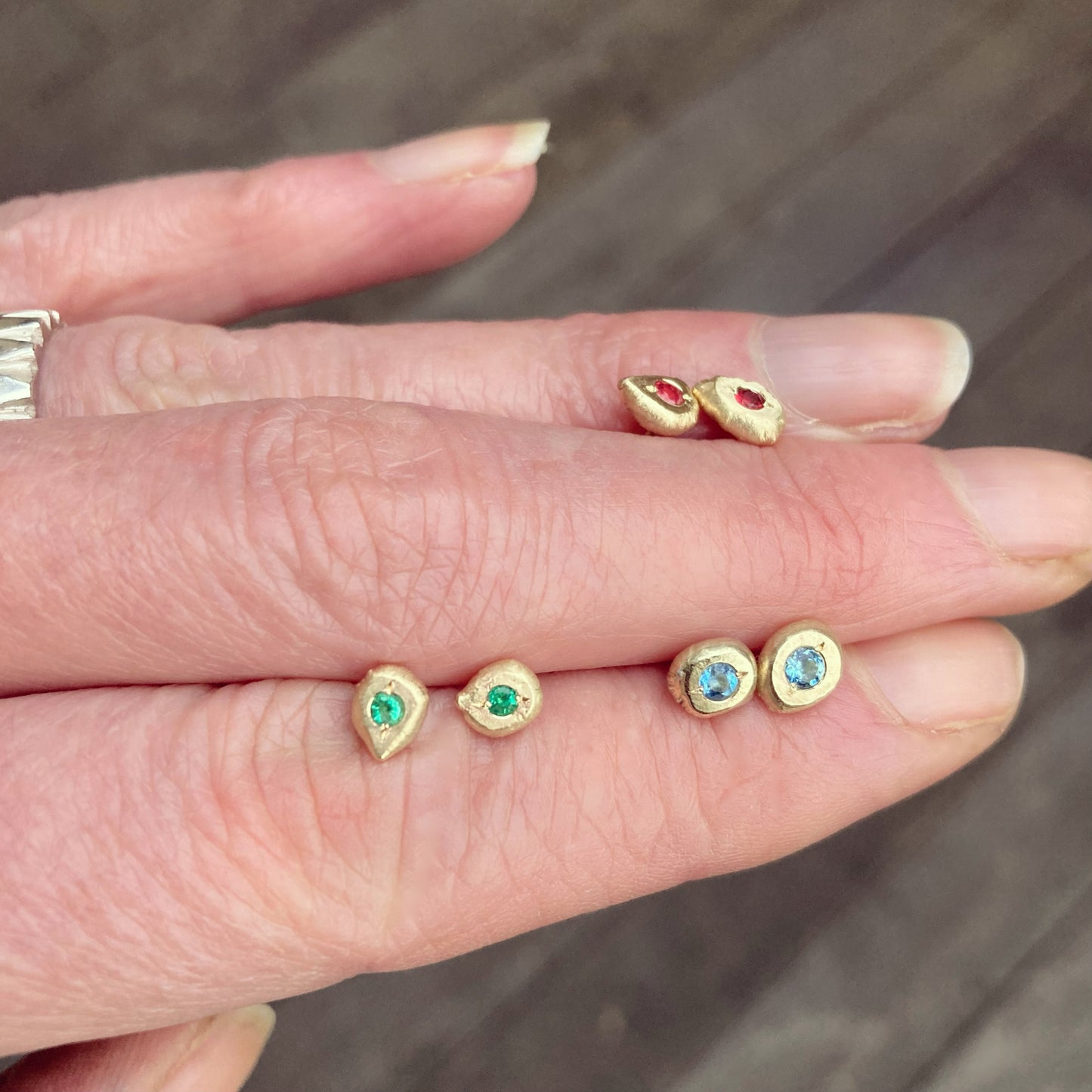 Freeform 9ct gold studs with emerald