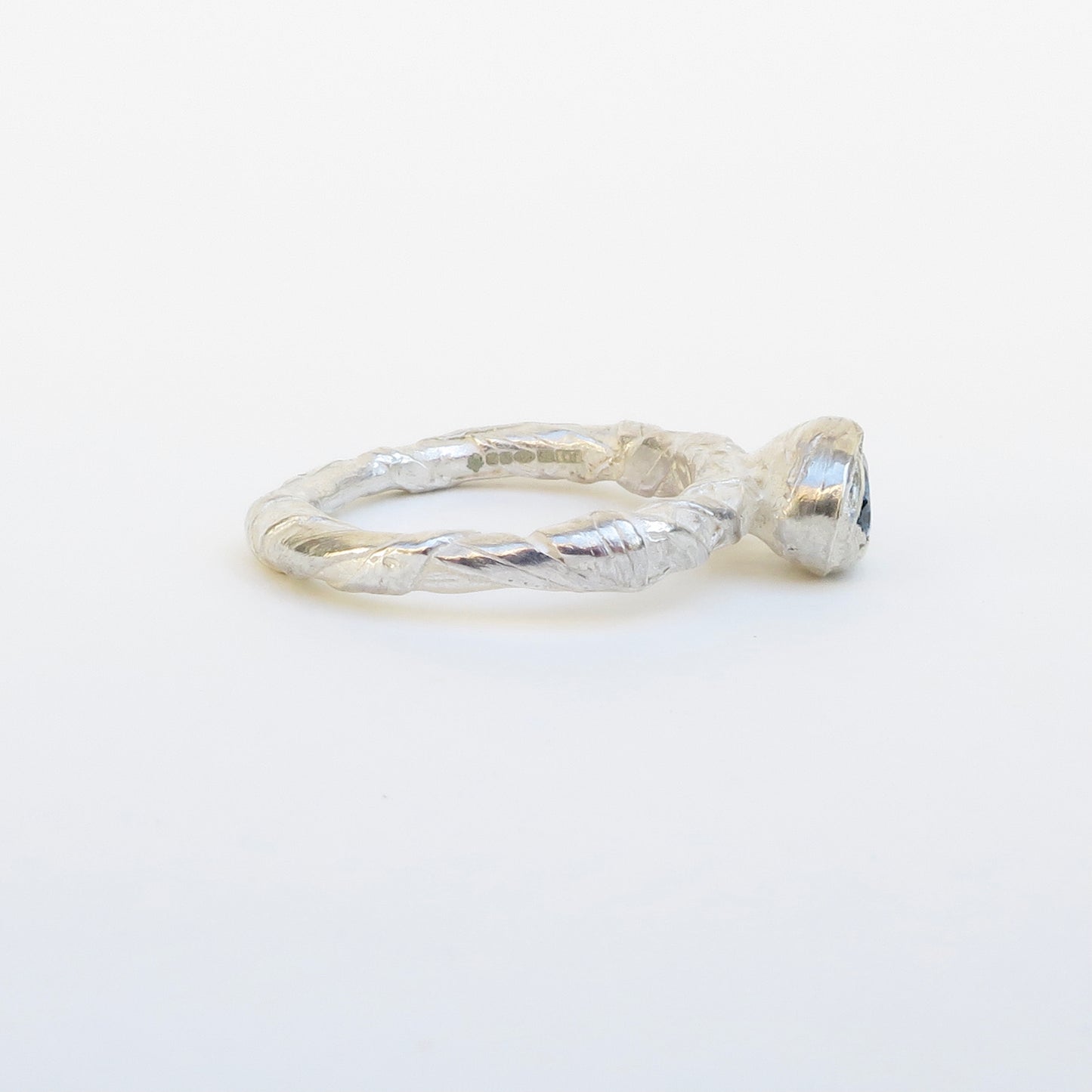Woven ring in organic setting