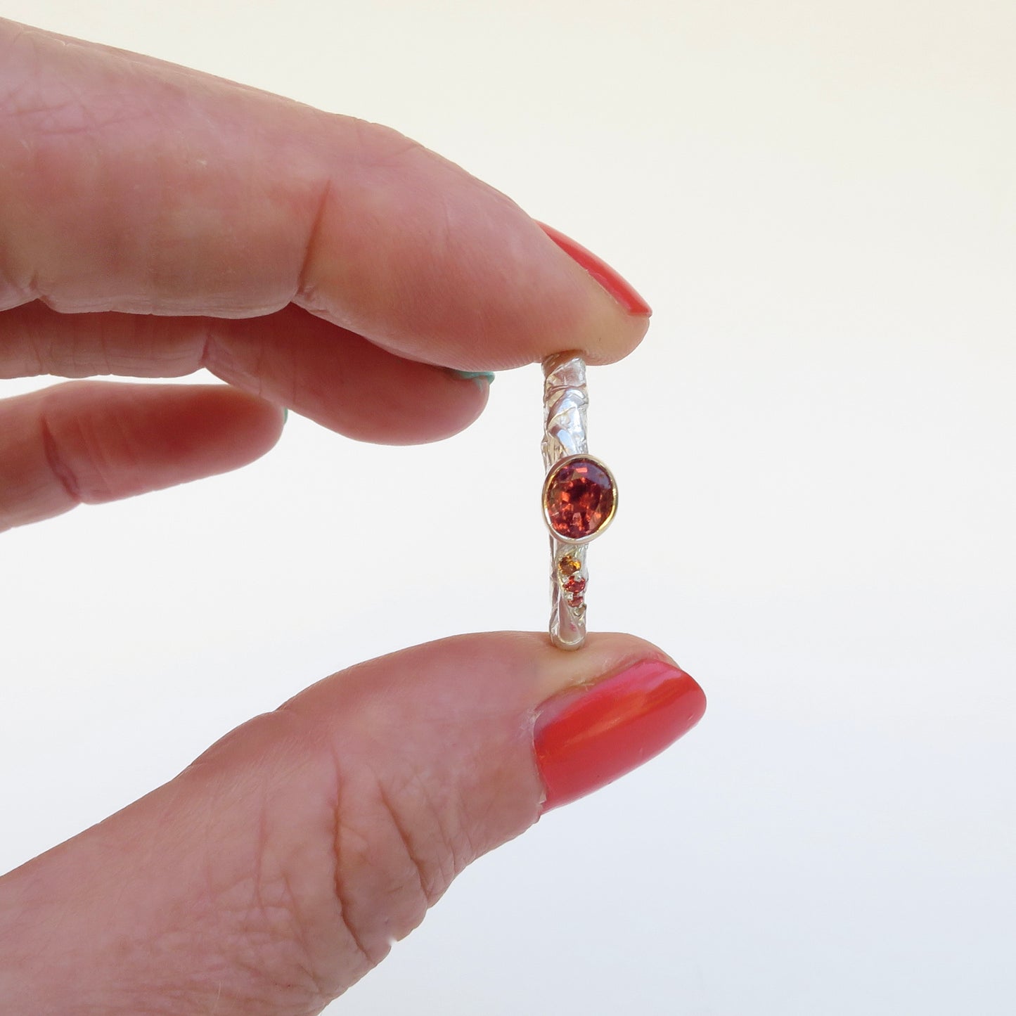 Woven spinel and sapphires