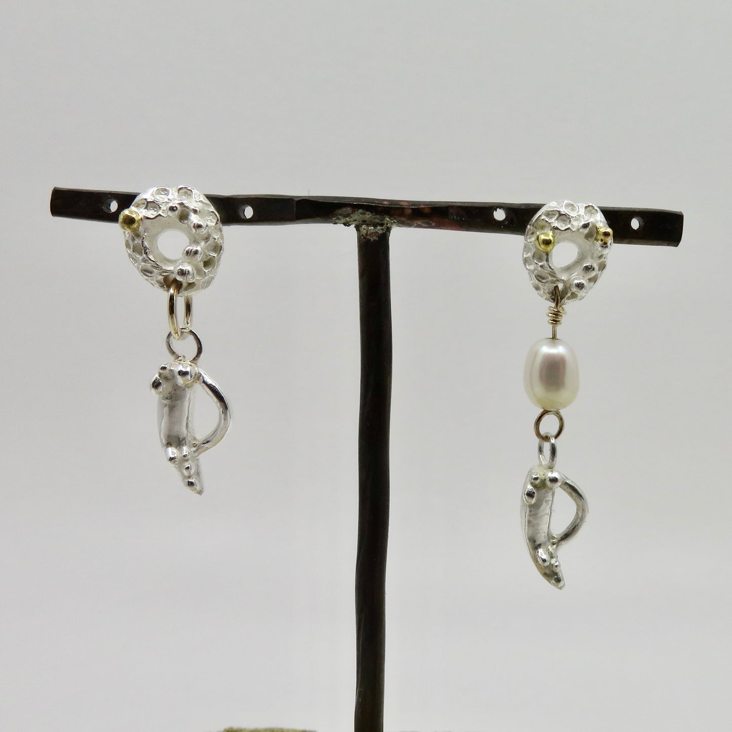 Silver and gold sea hugging pearl earrings