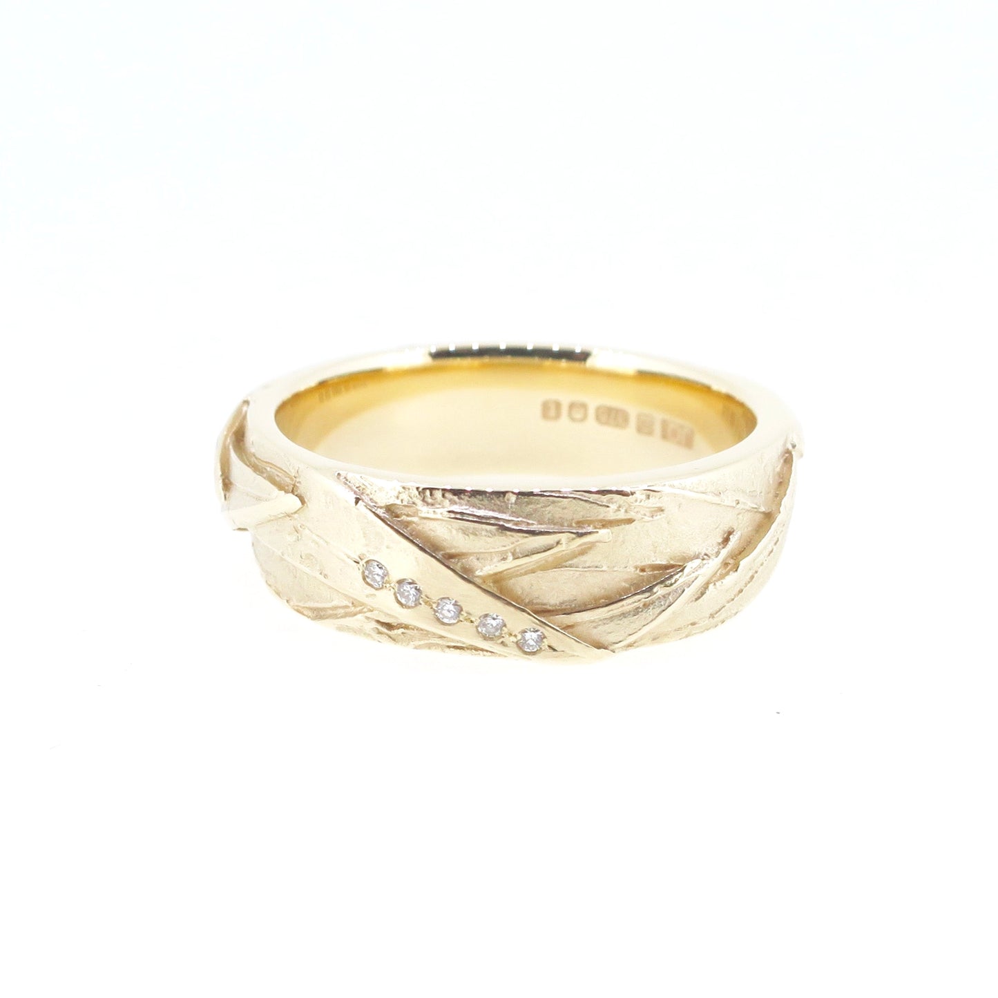 Woven ring with diamonds