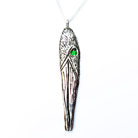 Woodpecker pendant with emeralds
