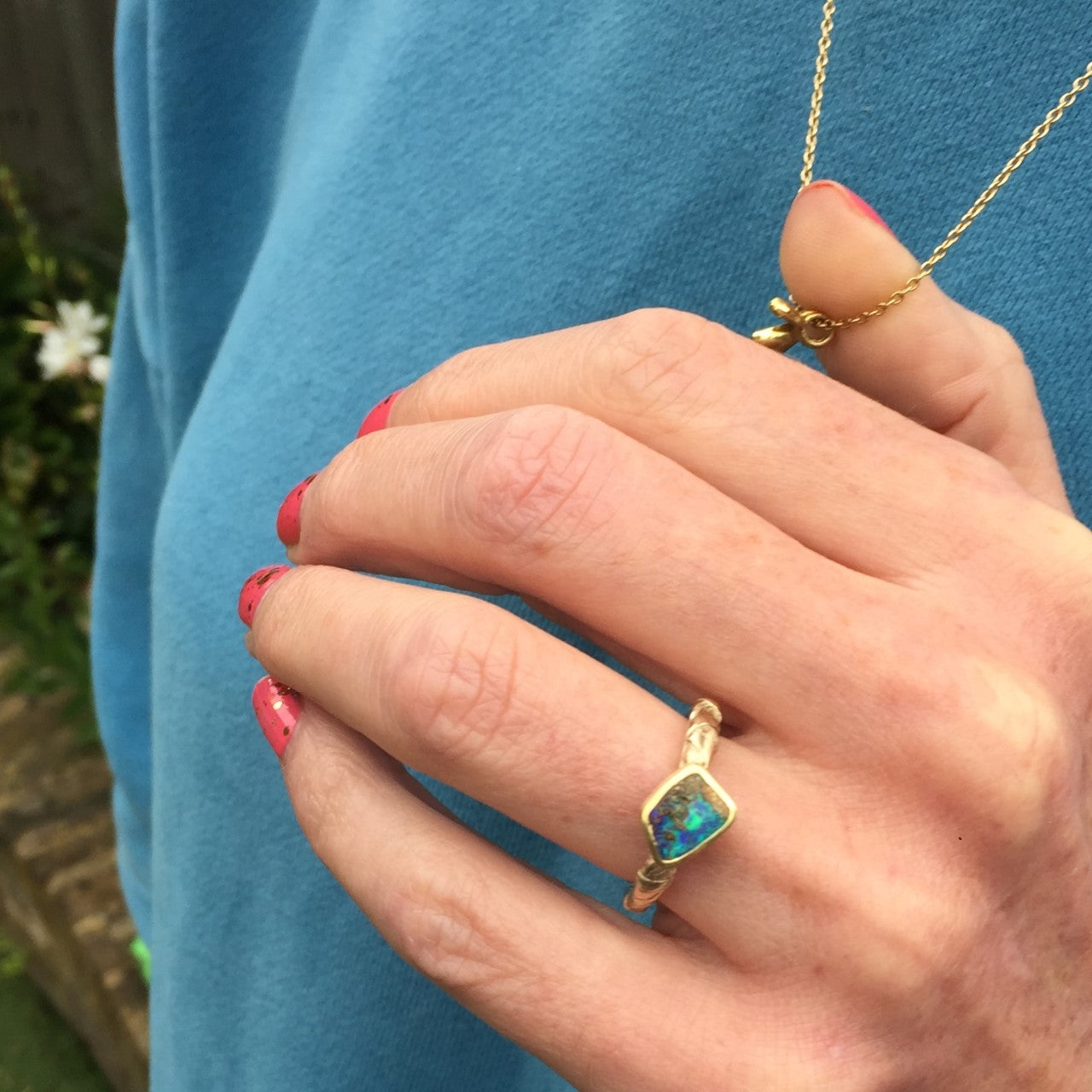 Woven ring with opal