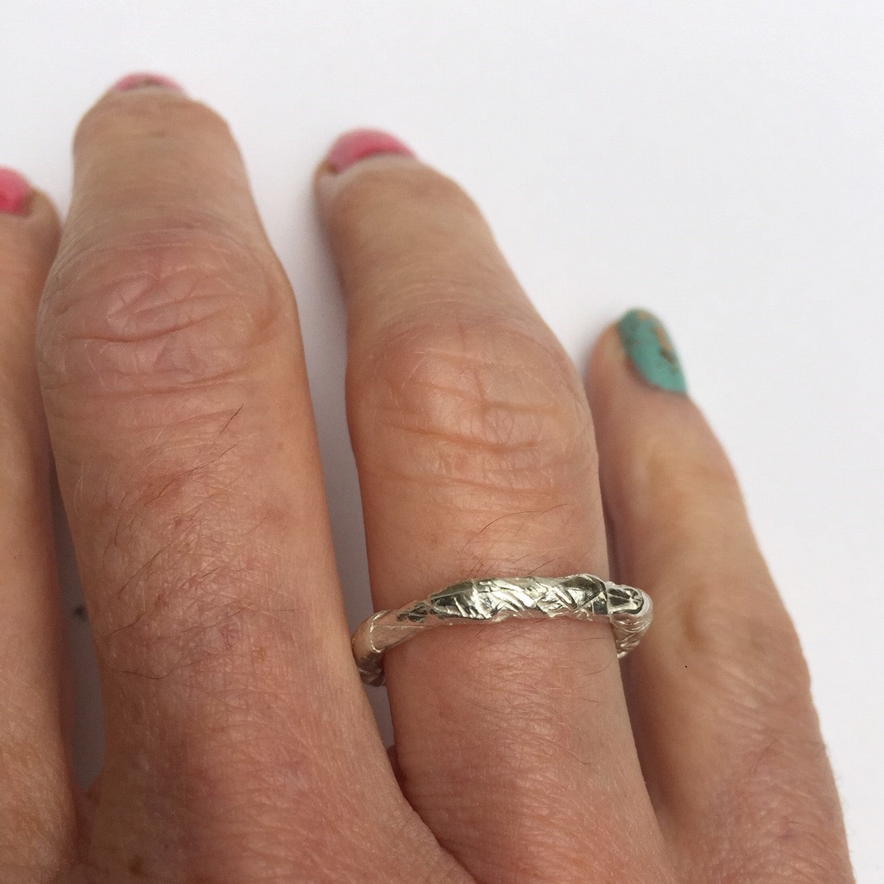 Woven ring silver